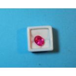 A loose oval cut natural pink sapphire, 10.5 carats, with GGL certificate (enhanced)