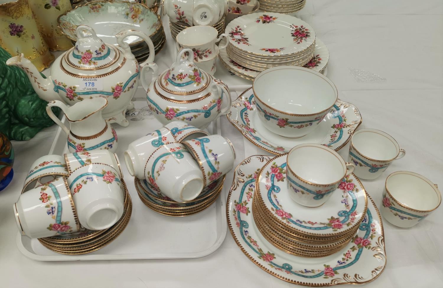 A 19th century Rockingham style tea service with gilt and polychrome decorayion