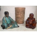 A Chinese carved bamboo brush pot and 2 figures