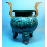 An 18th / 19th century Chinese incense burner, turquoise glazed with raised gilt handles, releif
