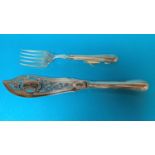 A Victorian pair of silver fish servers with engraved and pierced decoration, maker William