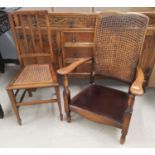 A 1930's cane back low seat armchair