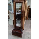 A mahogany reproduction cheval mirror with drawer to base