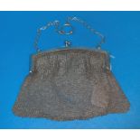 A silver mesh evening purse, with import marks, 3.5 oz