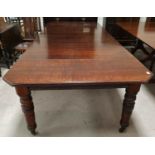 A Victorian oak dining table, length 9'6" x 4'2", constructed from a large wind out table