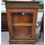 A 19th century satinwood pier cabinet with crossbanded and inlaid decoration, gilt metal beading and