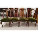 A set of 4 Edwardian carved walnut dining chairs