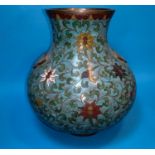 A Chinese cloisonne baluster vase decorated with flowers and leaves against a turquoise ground,