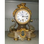 A 19th century mantel clock in gilt metal and alabaster, white enamel dial and French timepiece