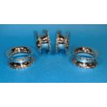 A set of 4 silver napkin rings with scrolled borders, Birmingham 1912, 3 oz