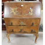 A walnut reproduction fall front bureau with 2 doors, chinoiserie decoration