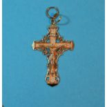 A yellow metal crucifix pendant, unmarked, 9.7gm (tests as 14+)