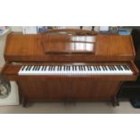 A mid 20th century Evestaff 'Miniroyal' walnut cased iron framed overstrung piano