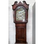 A 19th century grandfather clock in oak case, with 8 day movement and painted dial