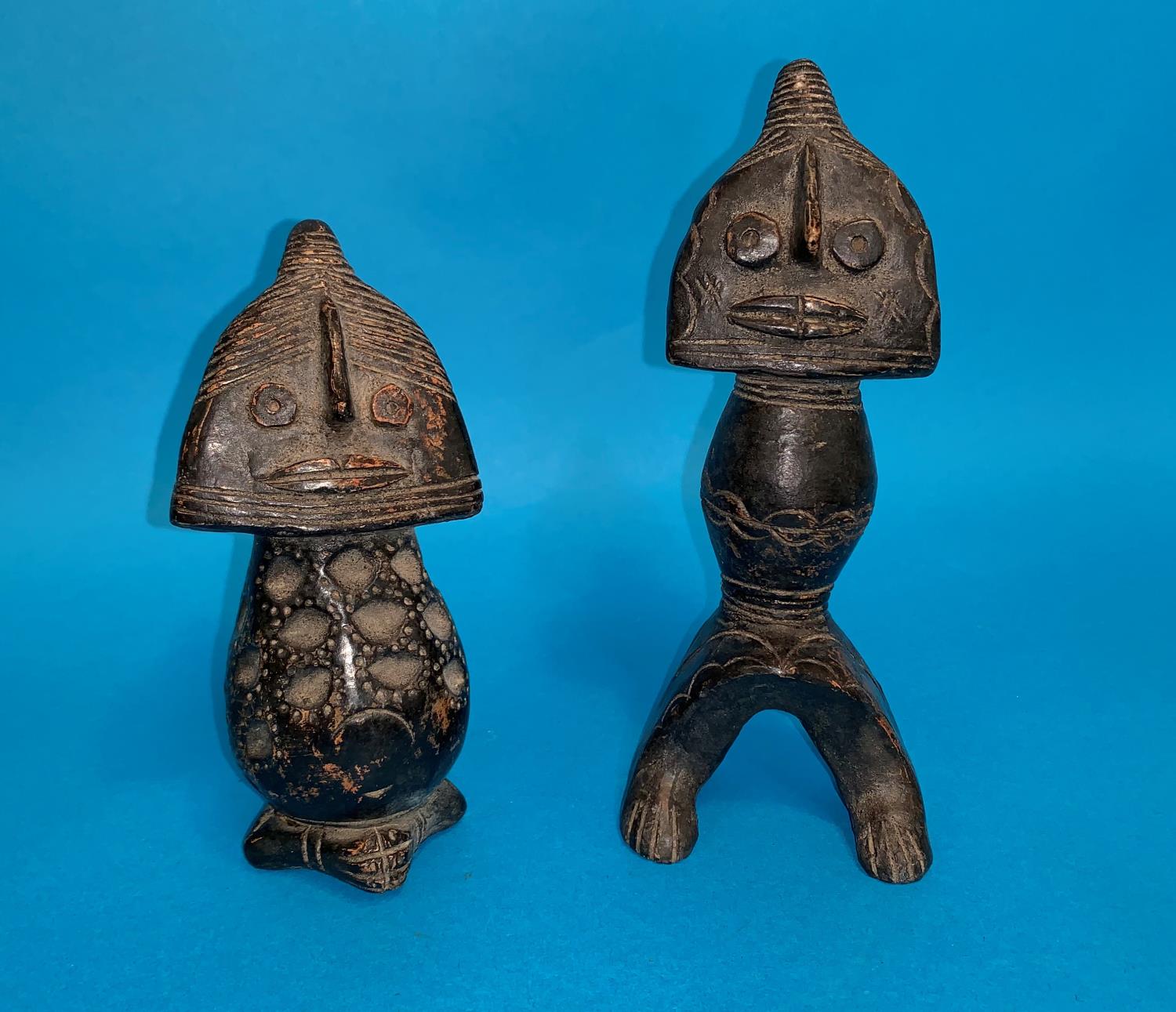 Two African Tribal pottery stylised figures, height 7" and 6"