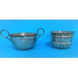 A silver porringer, Sheffield 1922; a sugar bowl, London 1891, total 5.5 oz