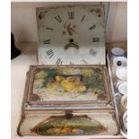 A 30 hour longcase clock movement with painted dial and a decorative tin