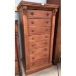 A Victorian style mahogany 8 drawer Wellington chest with side locking mechanism, carved mounts