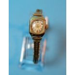A ladies Zodiac 9 carat hallmarked gold wristwatch on chevron link strap, stamped '375', 17.7 gm
