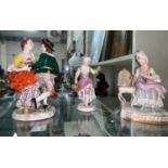 Two late 19th/early 20th century Meissen groups and one Derby: dancing couple, height 7", unmarked;