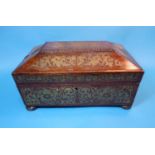 A large early 19th century rosewood box, sarcophagus shaped with extensive brass inlay, with pad and