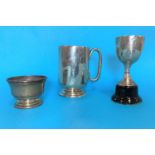 A silver christening cup, Birmingham 1919; a silver salt, 4.3 oz total; a small silver cup presented