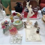 A Royal Doulton figure "Cissie"; a Royal Worcester figure "Spirit of Peace"; encrusted china; etc.