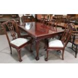 A mahogany Chippendale style dining suite on cabriole legs and ball and claw feet, comprising