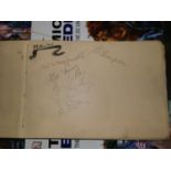 A WWII period autograph book with cartoons of Hitler; a caricature of Stalin; etc.; an autograph
