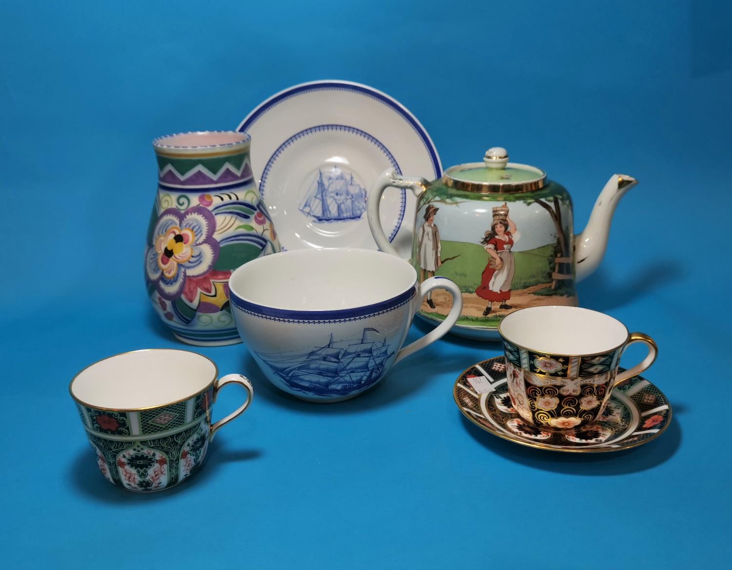 A Poole vase; a selection of decorative teapots; other china