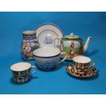 A Poole vase; a selection of decorative teapots; other china