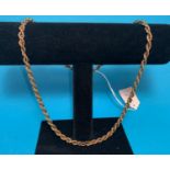A rope twist chain stamped '9K', 9 gm