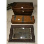 A Georgian mahogany sarcophagus shaped tea caddy; a mirror; a brass bound box