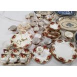 A Royal Albert Old Country Roses tea and dinner service, 35 pieces; 3 bone china trio sets; etc.