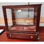 A table top mahogany display case