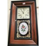 A 19th century American rectangular wall clock with original spring driven movement, white enamel