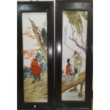 A pair of Chinese porcelain wall hanging rectangular plaques with traditional scenes and signatures