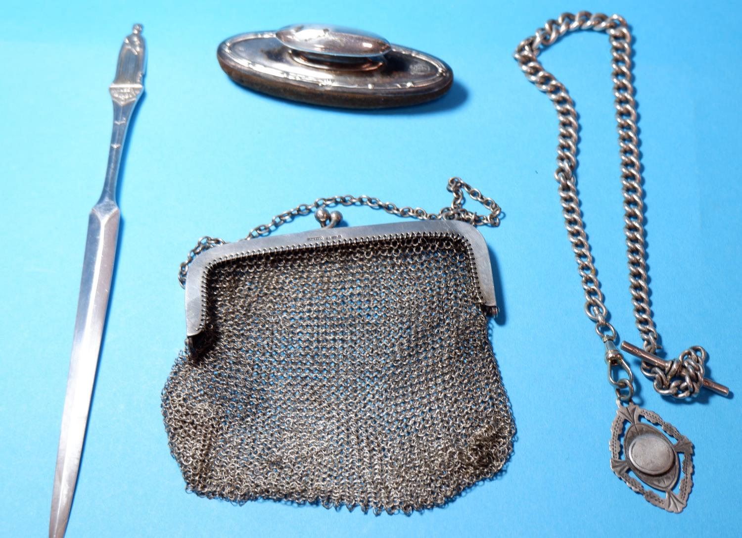 A ladies hallmarked silver mesh evening purse; a hallmarked silver QEII Coronation paperknife; a