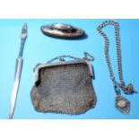 A ladies hallmarked silver mesh evening purse; a hallmarked silver QEII Coronation paperknife; a