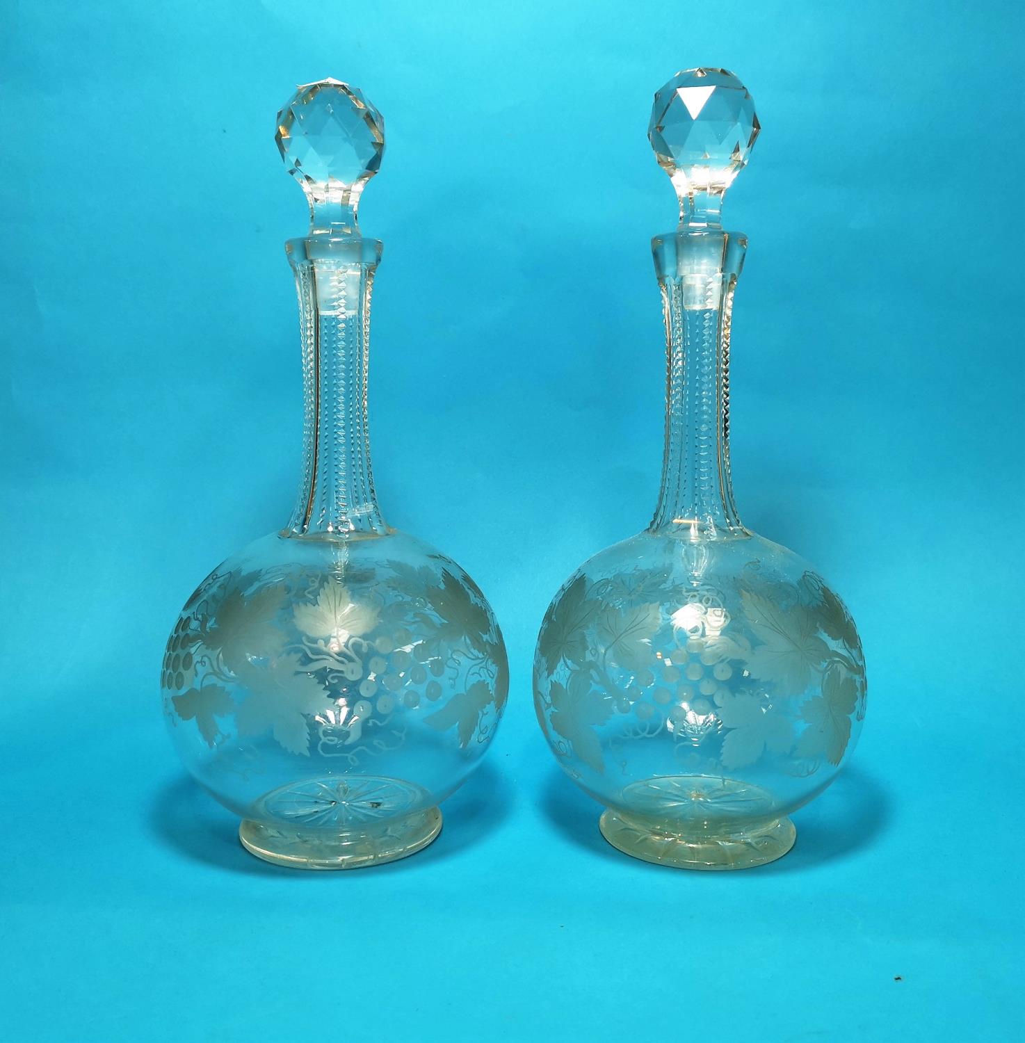 A pair of Victorian cut and engraved decanters; a selection of other cut glass