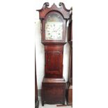 A 19th century grandfather clock in oak case, with 8 day movement and painted dial