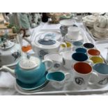 A selection of Susie Cooper china: 16 pieces of teaware decorated with fruit; 13 pieces of "