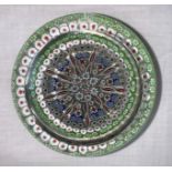 A millefiori and radial twists faceted paperweight, lettered 'P' on one of the outer green cones