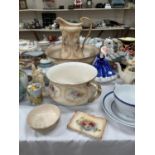 A Royal Devon jug and bowl set with chamber pot; a Royal Doulton figure: Mary HN 3375