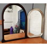 A modern wall mirror in arched mahogany finish frame; a similar in giltwood frame, 36"