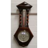 A 1930's oak cased barometer with thermometer; a 1930's mantel clock with battery movement; a