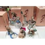 A selection of 7 Nao porcelain figures