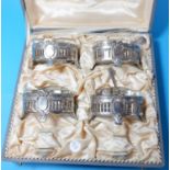 A set of 4 continental secessionist style salts with pierced and embossed decoration and glass