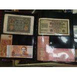 An album of world bank notes