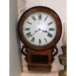 A 19th century American rosewood wall clock with drop dial; a wall clock with coloured dial